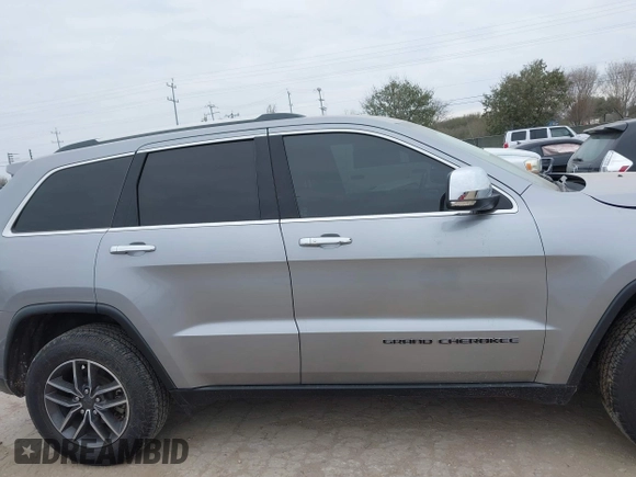 2019 Jeep Grand Cherokee Limited z VIN 1C4RJEBG8KC752297, wystawiony jako IAAI lot #41580741 z przebiegiem 142 981 mil mil oraz . Historia ofert i sprzedaży dostępna na DreamBid. Obrazek 14.