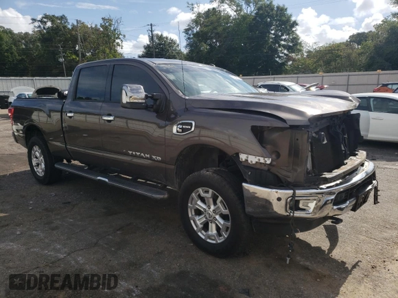 2017 Nissan Titan XD SL with VIN 1N6BA1F44HN510174, listed as a Copart auction lot 63245694 with 121,868 mi miles and Salvage Title. Bid and sale history available at carsss.com. Image 4.
