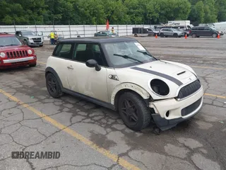 2007 MINI Hardtop S with VIN WMWMF73587TL87127, listed as a IAAI auction lot 42648540 with Not provided miles and . Bid and sale history available at DreamBid. Image 1.