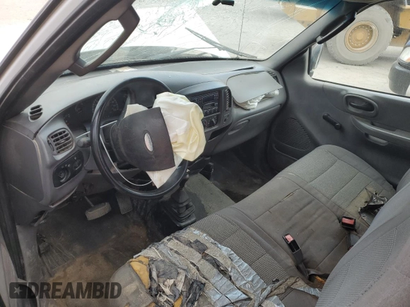 2002 Ford F-150 XL z VIN 1FTRF18W92NB71226, wystawiony jako Copart lot #76082214 z przebiegiem Nie podano mil oraz Szkoda całkowita • Salvage title. Historia ofert i sprzedaży dostępna na DreamBid. Obrazek 8.