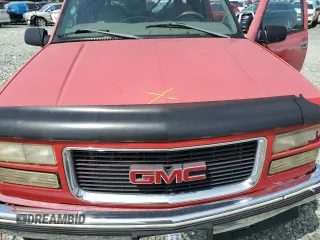 1999 GMC Yukon with VIN 1GKEK13R5XJ700234, listed as a Copart auction lot 55885584 with 163,129 mi miles and Salvage Title. Bid and sale history available at carsss.com. Image 12.