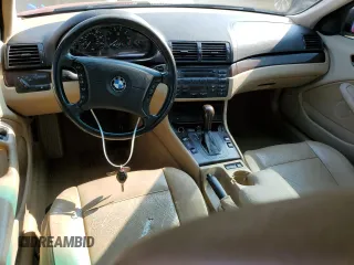 2004 BMW 3 Series 325i with VIN WBAEV33454KW15299, listed as a Copart auction lot 61406254 with 214,058 mi miles and Salvage Title. Bid and sale history available at carsss.com. Image 8.