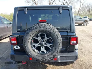 2018 Jeep Wrangler Rubicon z VIN 1C4HJXCG9JW193703, wystawiony jako IAAI lot #42065185 z przebiegiem 61 518 mil mil oraz . Historia ofert i sprzedaży dostępna na DreamBid. Obrazek 16.