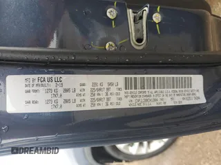 2019 Jeep Cherokee Latitude with VIN 1C4PJLCB9KD412004, listed as a Copart auction lot 61642015 with 121,336 mi miles and Salvage title. Bid and sale history available at DreamBid. Image 13.