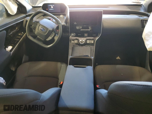 2024 Subaru Solterra Premium с VIN JTMABABA5RA069297, выставлен на аукционе Copart как лот 82713354 с пробегом 3 606 миль миль и Списание • Salvage title. История ставок и продаж доступна на DreamBid. Изображение 8.