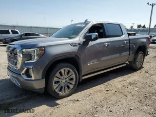 2022 GMC Sierra 1500 Limited Denali with VIN 1GTU9FEL8NZ101061, listed as a Copart auction lot 70757044 with 49,425 mi miles and Salvage Title. Bid and sale history available at carsss.com. Image 1.