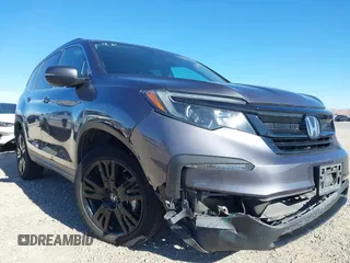 2022 Honda Pilot Special Edition with VIN 5FNYF5H27NB013972, listed as a IAAI auction lot 41219766 with 52,291 mi miles and . Bid and sale history available at carsss.com. Image 6.
