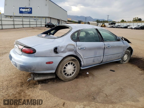 1998 Ford Taurus SE Comfort with VIN 1FAFP53S7WG223397, listed as a Copart auction lot 74794624 with 76,614 mi miles and Salvage title. Bid and sale history available at DreamBid. Image 3.