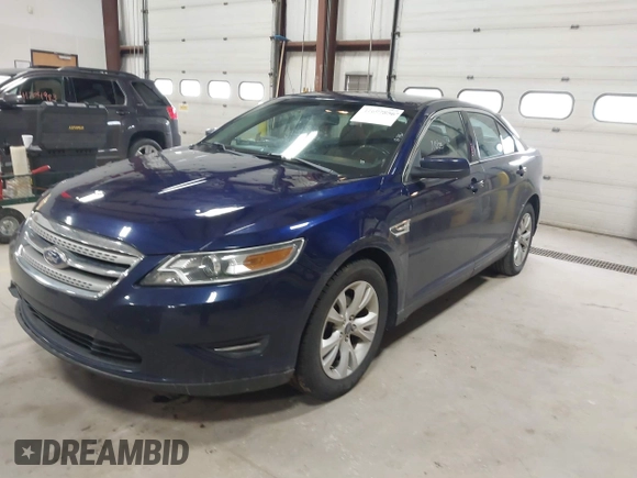 2011 Ford Taurus SEL with VIN 1FAHP2EW7BG174493, listed as a IAAI auction lot 41697856 with 143,957 mi miles. Bid and sale history available at carsss.com. Image 17.