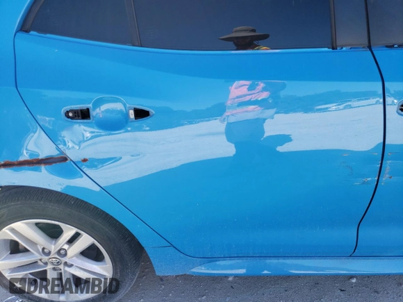 2021 Toyota Corolla Hatchback SE with VIN JTND4MBE5M3135173, listed as a Copart auction lot 60318104 with 55,308 mi miles and Salvage Title. Bid and sale history available at carsss.com. Image 11.