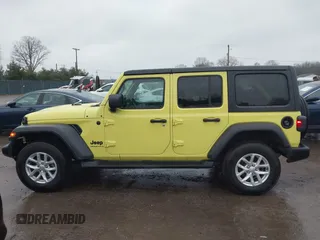 2023 Jeep Wrangler Sport with VIN 1C4HJXDG9PW631109, listed as a IAAI auction lot 41149861 with 27,570 mi miles and . Bid and sale history available at DreamBid. Image 14.