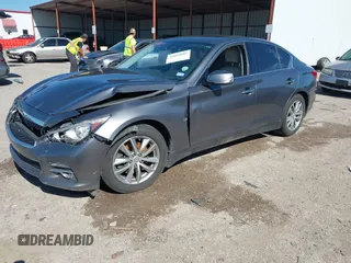 2015 Infiniti Q50 Premium z VIN JN1BV7AR9FM408386, wystawiony jako IAAI lot #42084887 z przebiegiem 122 527 mil mil oraz . Historia ofert i sprzedaży dostępna na DreamBid. Obrazek 18.