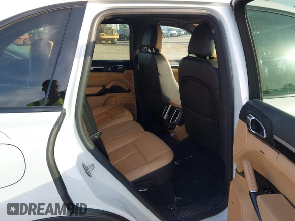 2014 Porsche Cayenne with VIN WP1AA2A23ELA97180, listed as a IAAI auction lot 42072423 with 143,374 mi miles and . Bid and sale history available at DreamBid. Image 8.