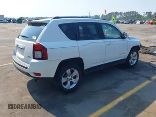 2014 Jeep Compass Latitude with VIN 1C4NJCEB7ED794428, listed as a IAAI auction lot 41995264 with 182,413 mi miles. Bid and sale history available at carsss.com. Image 4.