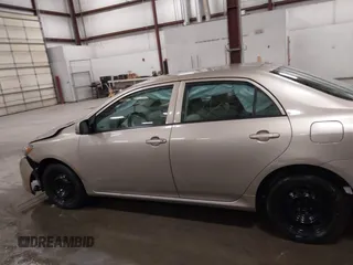 2009 Toyota Corolla with VIN 1NXBU40E19Z014460, listed as a IAAI auction lot 41973023 with 74,927 mi miles. Bid and sale history available at carsss.com. Image 14.