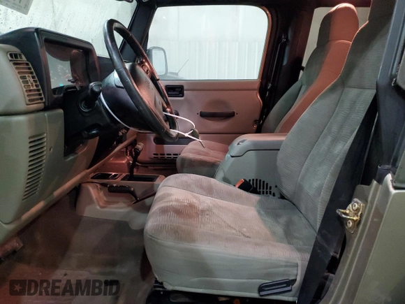 2003 Jeep Wrangler Rubicon z VIN 1J4FA69S13P345591, wystawiony jako Copart lot #41741685 z przebiegiem 85 335 mil mil oraz Szkoda całkowita • Salvage title. Historia ofert i sprzedaży dostępna na DreamBid. Obrazek 7.