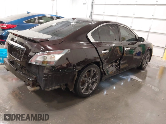 2014 Nissan Maxima SV z VIN 1N4AA5AP5EC910605, wystawiony jako IAAI lot #42082685 z przebiegiem 83 628 mil mil oraz . Historia ofert i sprzedaży dostępna na DreamBid. Obrazek 4.