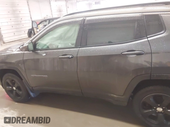 2018 Jeep Compass Altitude with VIN 3C4NJDBB6JT187581, listed as a IAAI auction lot 41542689 with 126,147 mi miles and . Bid and sale history available at carsss.com. Image 14.