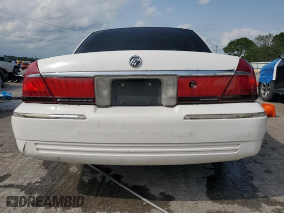 2000 Mercury Grand Marquis GS z VIN 2MEFM74WXYX699560, wystawiony jako Copart lot #57721925 z przebiegiem 246 297 mil mil oraz Szkoda całkowita • Salvage title. Historia ofert i sprzedaży dostępna na DreamBid. Obrazek 6.