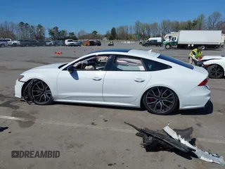 2021 Audi S7 Prestige z VIN WAUSFBF22MN075994, wystawiony jako IAAI lot #41903379 z przebiegiem Nie podano mil oraz . Historia ofert i sprzedaży dostępna na DreamBid. Obrazek 14.