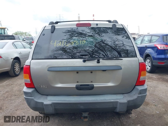 2001 Jeep Grand Cherokee Laredo z VIN 1J4GW48S01C658017, wystawiony jako IAAI lot #42160310 z przebiegiem 220 309 mil mil oraz . Historia ofert i sprzedaży dostępna na DreamBid. Obrazek 17.