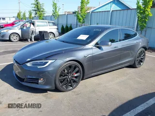 2017 Tesla Model S 100D with VIN 5YJSA1E49HF189008, listed as a IAAI auction lot 42051518 with 49,145 mi miles and . Bid and sale history available at DreamBid. Image 2.