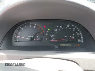 2002 Toyota Camry LE z VIN 4T1BE30KX2U591037, wystawiony jako IAAI lot #42077641 z przebiegiem 86 569 mil mil oraz . Historia ofert i sprzedaży dostępna na DreamBid. Obrazek 15.