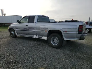 2001 Dodge Ram 3500 with VIN 1B7MC33W71J574245, listed as a Copart auction lot 84877774 with 200,945 mi miles and Salvage Title. Bid and sale history available at carsss.com. Image 2.