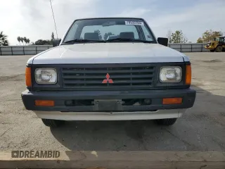 1988 Mitsubishi Mighty Max z VIN JA7FL24D2JP013297, wystawiony jako Copart lot #79533724 z przebiegiem 117 397 mil mil oraz Tytuł czysty. Historia ofert i sprzedaży dostępna na DreamBid. Obrazek 5.
