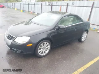 2010 Volkswagen Eos Komfort with VIN WVWBA7AH2AV020306, listed as a IAAI auction lot 42066892 with 180,841 mi miles. Bid and sale history available at carsss.com. Image 2.