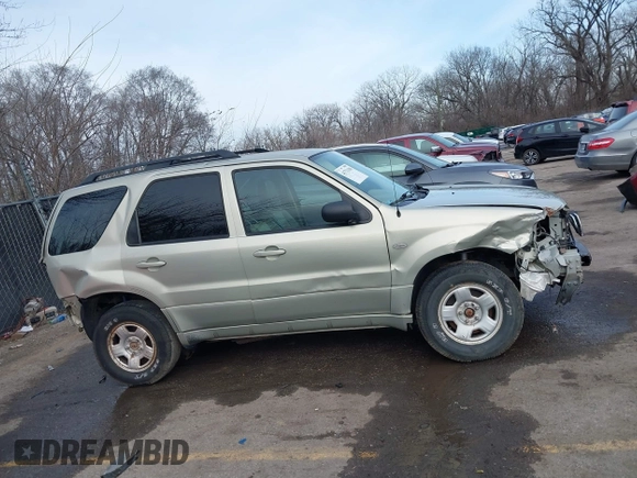 2005 Mercury Mariner Luxury z VIN 4M2YU57175DJ05986, wystawiony jako IAAI lot #41713180 z przebiegiem 243 682 mil mil oraz . Historia ofert i sprzedaży dostępna na DreamBid. Obrazek 13.