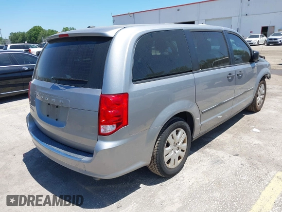 2016 Dodge Grand Caravan SE with VIN 2C4RDGBG9GR385847, listed as a IAAI auction lot 42042755 with 32,613 mi miles and . Bid and sale history available at DreamBid. Image 4.