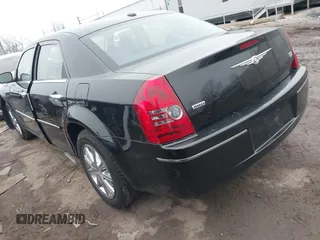 2010 Chrysler 300 Touring with VIN 2C3CK5CV5AH169539, listed as a IAAI auction lot 41560909 with 152,956 mi miles. Bid and sale history available at carsss.com. Image 3.