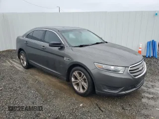 2018 Ford Taurus SE z VIN 1FAHP2D88JG129449, wystawiony jako Copart lot #56127615 z przebiegiem 127 589 mil mil oraz Czysty tytuł • Clean title. Historia ofert i sprzedaży dostępna na DreamBid. Obrazek 4.