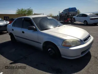1997 Honda Civic LX z VIN JHMEJ6671VS036302, wystawiony jako Copart lot #54006905 z przebiegiem 201 909 mil mil oraz Szkoda całkowita • Salvage title. Historia ofert i sprzedaży dostępna na DreamBid. Obrazek 4.