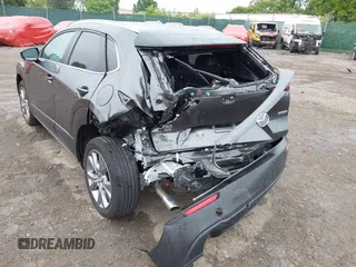 2023 Mazda CX-30 S Preferred z VIN 3MVDMBCM5PM576771, wystawiony jako IAAI lot #42244842 z przebiegiem 14 814 mil mil oraz . Historia ofert i sprzedaży dostępna na DreamBid. Obrazek 6.