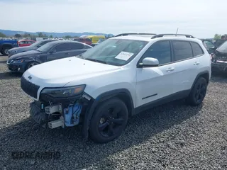 2019 Jeep Cherokee Latitude Plus with VIN 1C4PJMLX2KD432659, listed as a IAAI auction lot 42011291 with 76,015 mi miles. Bid and sale history available at carsss.com. Image 2.