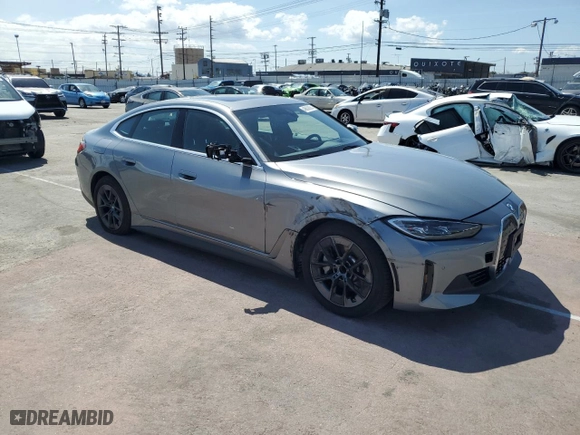 2023 BMW i4 eDrive40 with VIN WBY73AW02PFN60384, listed as a Copart auction lot 48636984 with 13,504 mi miles. Bid and sale history available at carsss.com. Image 4.