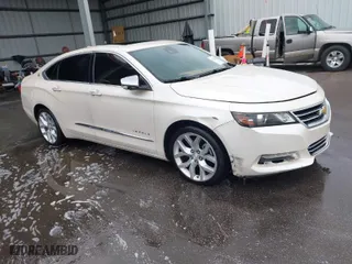 2014 Chevrolet Impala LTZ with VIN 1G1155S38EU105260, listed as a IAAI auction lot 42012082 with 230,407 mi miles. Bid and sale history available at carsss.com. Image 1.