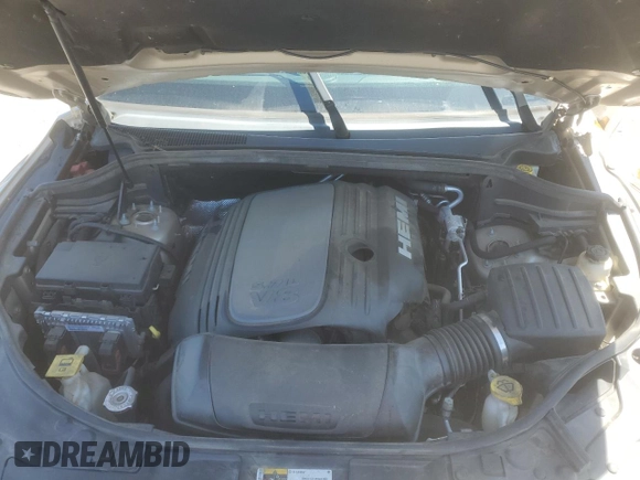 2015 Dodge Durango Citadel with VIN 1C4SDHET0FC873740, listed as a Copart auction lot 56067255 with 131,362 mi miles and Salvage title. Bid and sale history available at DreamBid. Image 12.
