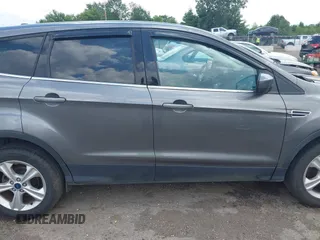 2013 Ford Escape SE with VIN 1FMCU9G95DUC01185, listed as a IAAI auction lot 42602840 with 140,697 mi miles and . Bid and sale history available at DreamBid. Image 13.
