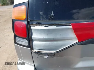 2001 Mitsubishi Montero ES z VIN JA4LS21HX1P041052, wystawiony jako IAAI lot #42084599 z przebiegiem 239 095 mil mil oraz . Historia ofert i sprzedaży dostępna na DreamBid. Obrazek 14.