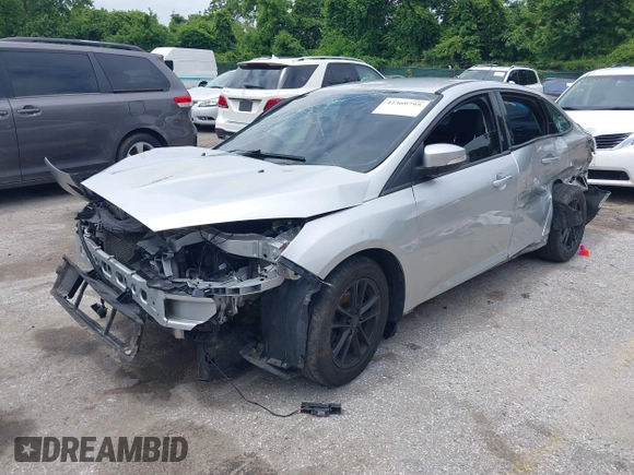 2016 Ford Focus SE z VIN 1FADP3F22GL373756, wystawiony jako IAAI lot #42369795 z przebiegiem 99 646 mil mil oraz . Historia ofert i sprzedaży dostępna na DreamBid. Obrazek 16.