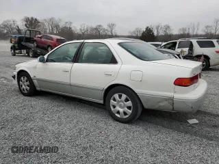 2001 Toyota Camry CE z VIN JT2BG22K210600687, wystawiony jako Copart lot #48807225 z przebiegiem 307 479 mil mil oraz Szkoda całkowita • Salvage title. Historia ofert i sprzedaży dostępna na DreamBid. Obrazek 2.