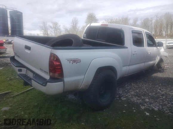 2005 Toyota Tacoma z VIN 5TEMU52N15Z050084, wystawiony jako Copart lot #89392445 z przebiegiem 158 752 mil mil oraz Szkoda całkowita • Salvage title. Historia ofert i sprzedaży dostępna na DreamBid. Obrazek 3.