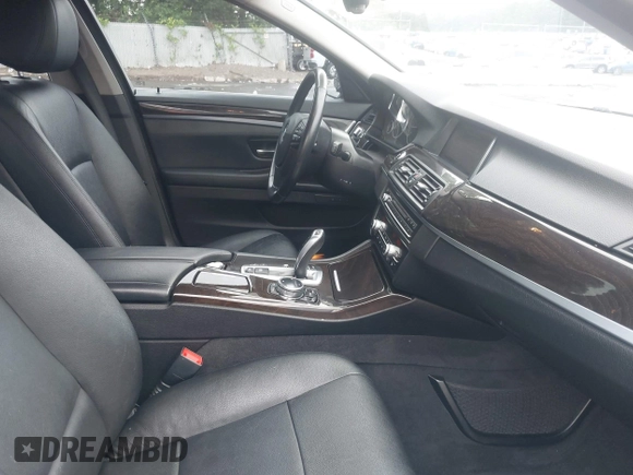 2014 BMW 5 Series 528i xDrive z VIN WBA5A7C53ED614914, wystawiony jako IAAI lot #42509306 z przebiegiem 137 903 mil mil oraz . Historia ofert i sprzedaży dostępna na DreamBid. Obrazek 5.