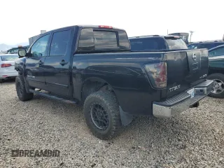 2010 Nissan Titan XE with VIN 1N6BA0EJ5AN318639, listed as a Copart auction lot 69776984 with 158,913 mi miles and Salvage Title. Bid and sale history available at carsss.com. Image 2.