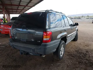 2004 Jeep Grand Cherokee Laredo with VIN 1J4GX48N64C436853, listed as a IAAI auction lot 41785918 with 118,578 mi miles. Bid and sale history available at carsss.com. Image 4.