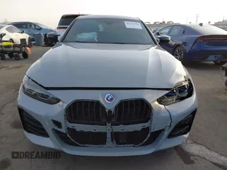 2023 BMW 4 Series M440i with VIN WBA63AW02PFN40551, listed as a IAAI auction lot 41230910 with 23,526 mi miles and . Bid and sale history available at DreamBid. Image 12.