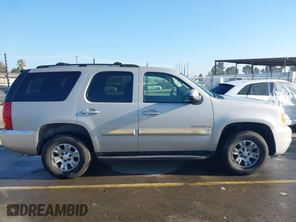 2007 GMC Yukon SLT with VIN 1GKFC13077J253697, listed as a IAAI auction lot 41277881 with 246,059 mi miles. Bid and sale history available at carsss.com. Image 13.